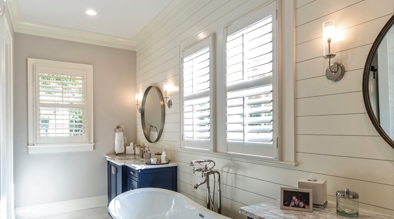 Denver bathroom with white plantation shutters.