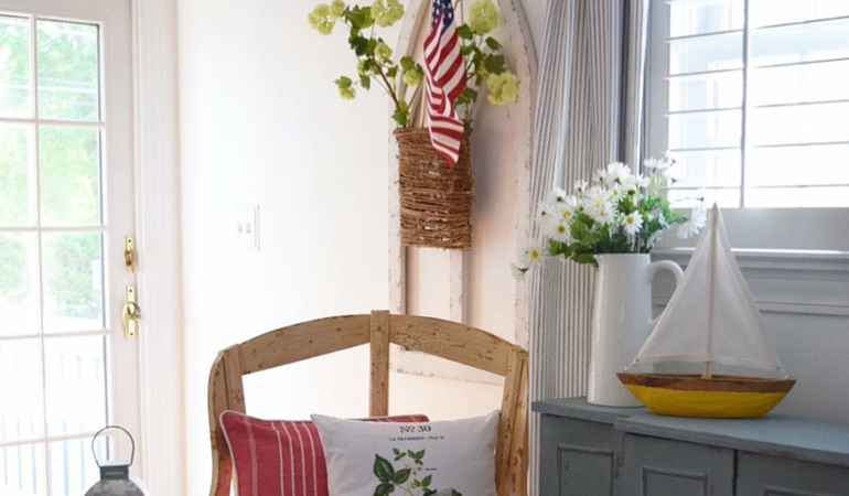 Bright sitting corner with faux wood plantation shutters in Denver. Faux wood plantation shutters in Denver