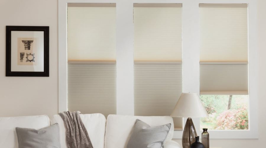 Cellular shades are energy efficient and stop air from entering through your window. Cellular shades in a Denver living room