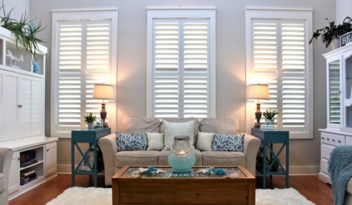 Shutter styles in Denver can range from subtle to elegant Denver modern sunroom with plantation shutters