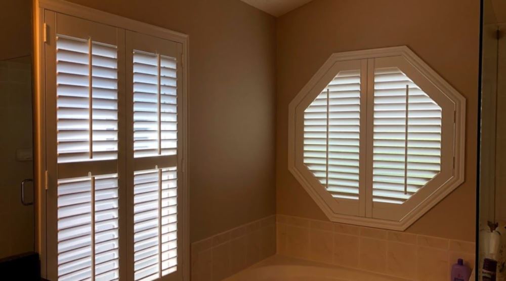 Octagon window treatments Octagon window in a Denver bathroom