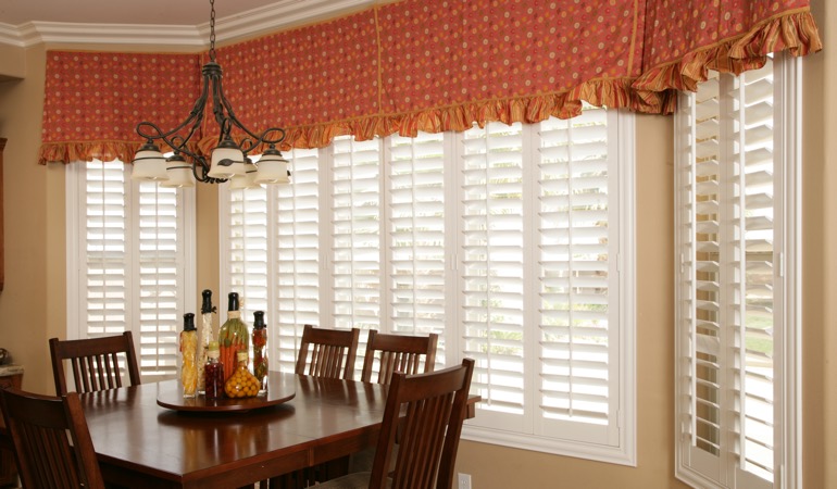 Decorative accents, drapes, and curtains may not reflect the simplicity you want. Plantation shutters in Denver dining room.