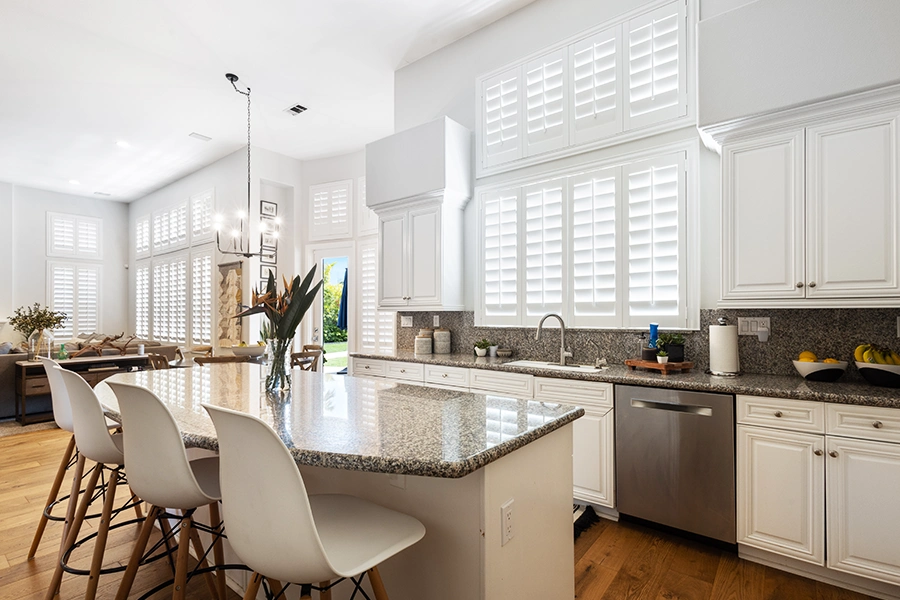 White Polywood shutters on kitchen windows